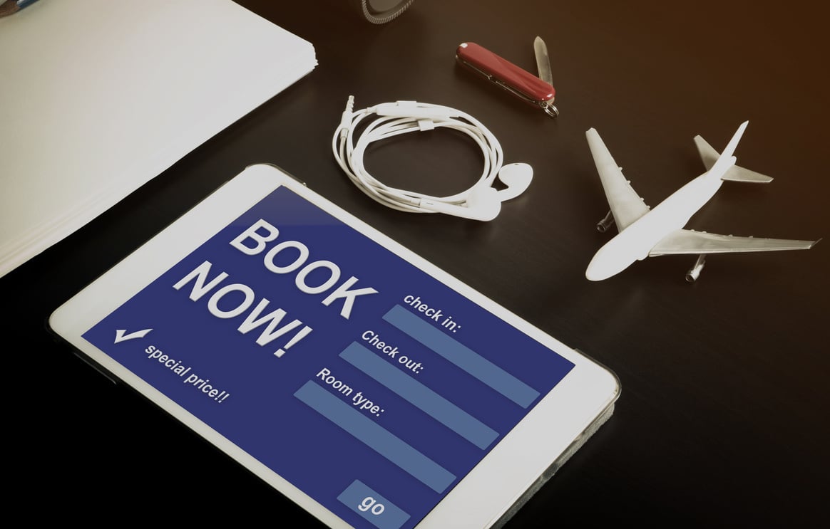 Hotel accommodation online booking website on tablet.